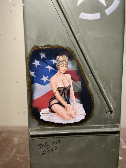 Vietnam ammo cannister with pin-up art